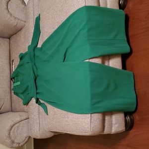 Green sleeveless jumpsuit with tie at waist